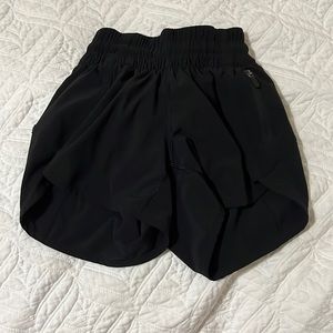Black tracker 4inch lululemon shorts size 0